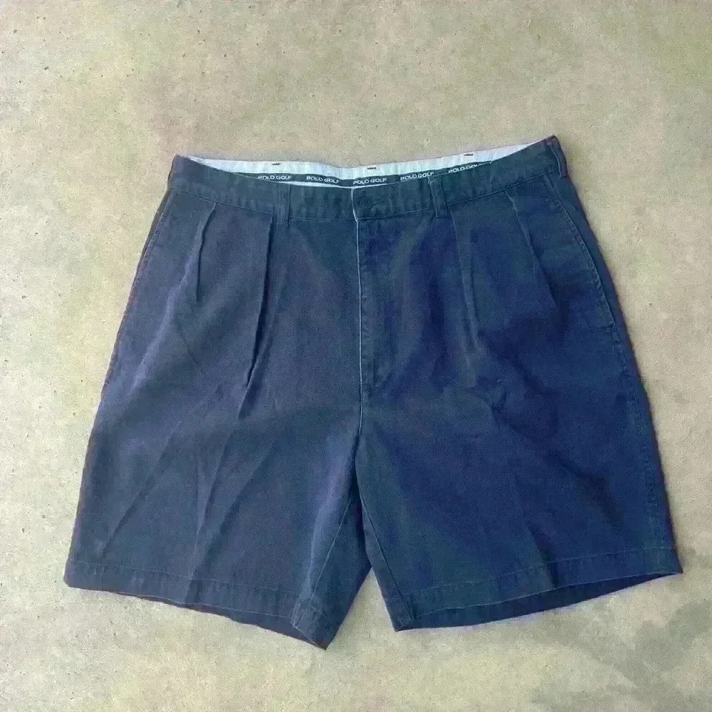 Polo golf pleated front navy shorts